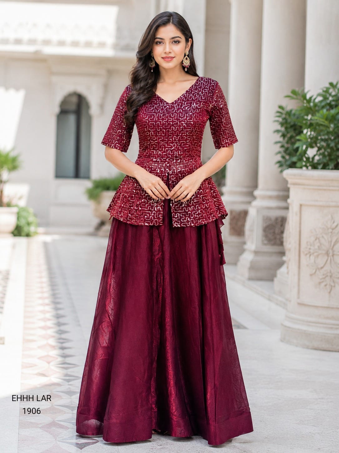 Georgette Sequins Embroidered Peplum Top with Shimmer Organza Lehenga.